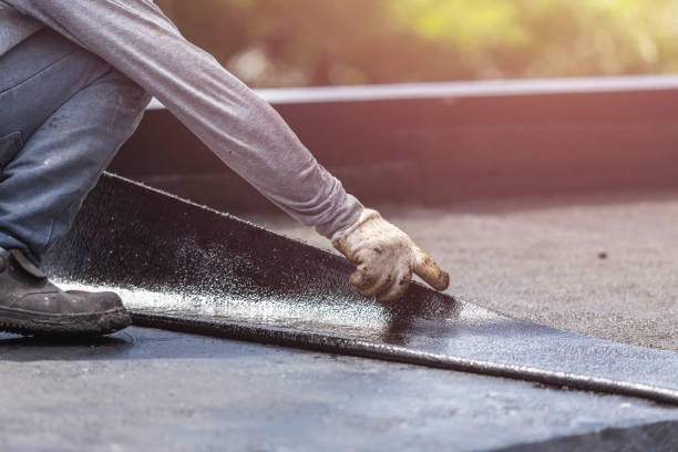 Professional Basement Waterproofing technician working in Elkton, MD